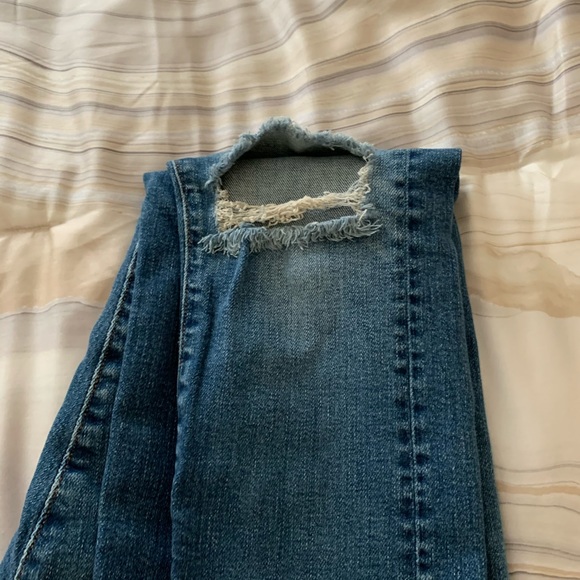 Low rise distressed denim. - Picture 5 of 7